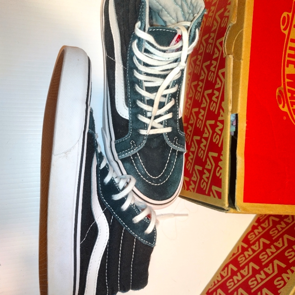 Vans high top,size 7.0 women 5.1/2 men ,black and white